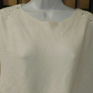 WHITE SWEATER WITH GEMSTONE GOING DOWN THE SLEEVE